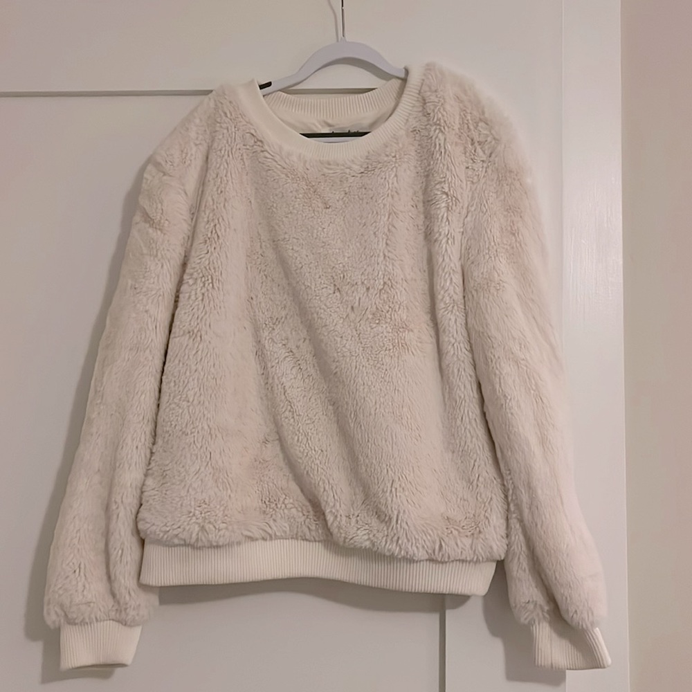 Chenille fleece pull over sweatshirt with ribbed trim.